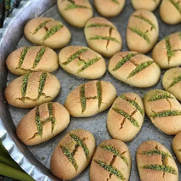مواد لازم و آموزش شیرینی تاتلیسی بادامی خانگی (مرحله به مرحله)