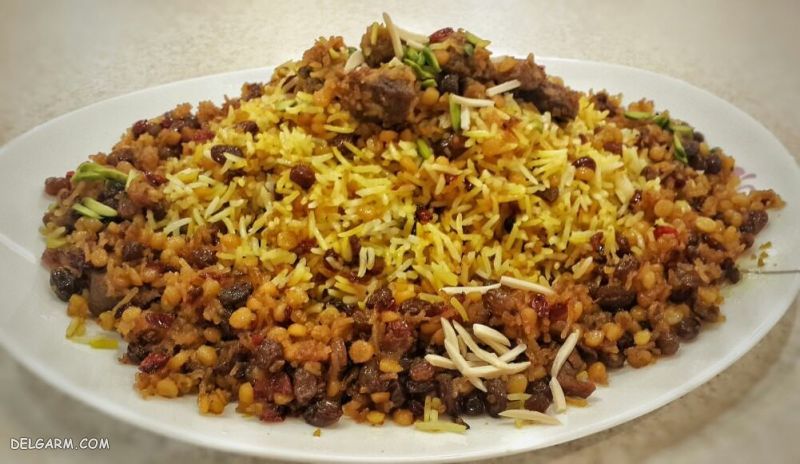دستور تهیه مانی پلو خوشمزه و مجلسی با گوشت و مرغ (مرحله به مرحله)