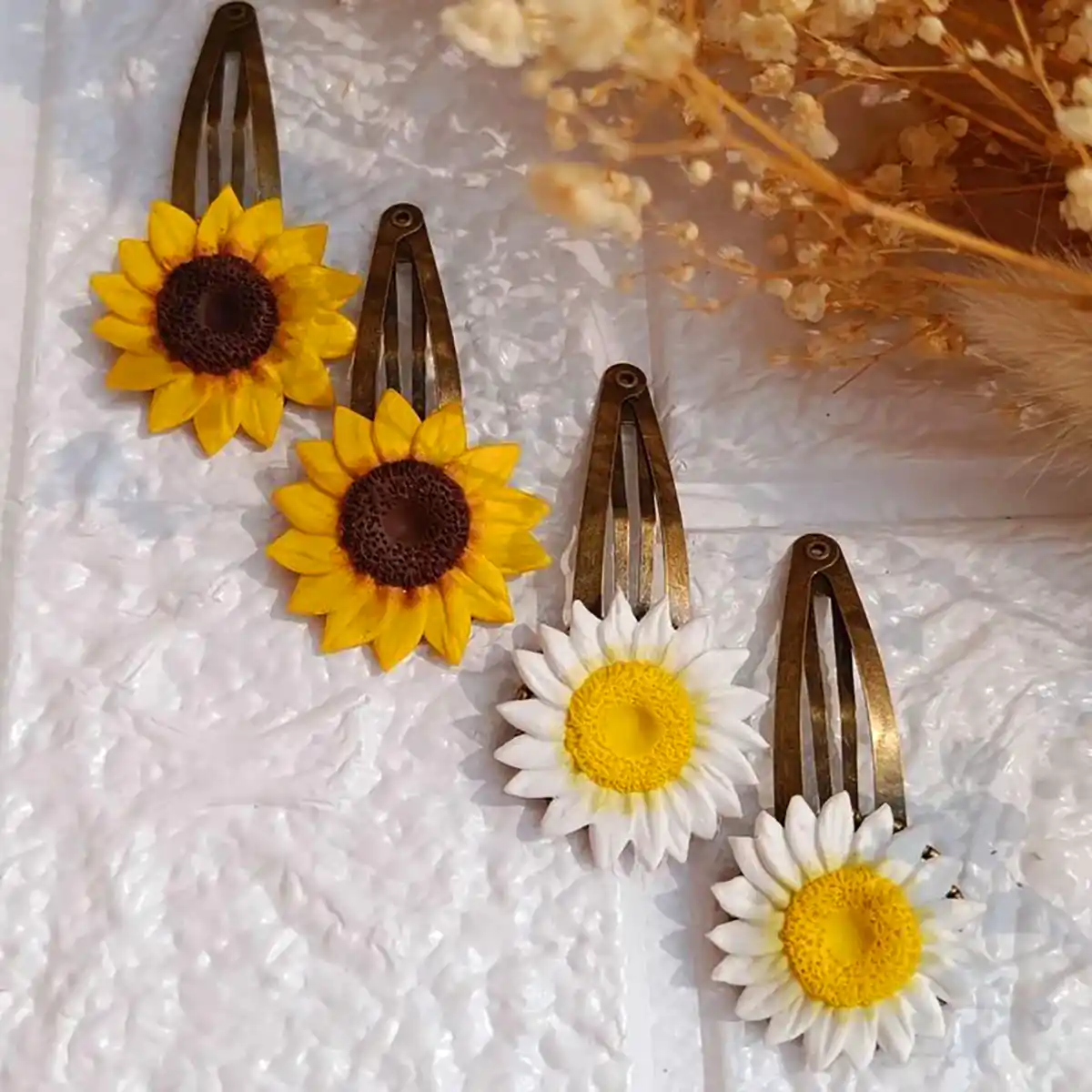 اکسسوری طرح گل آفتابگردون